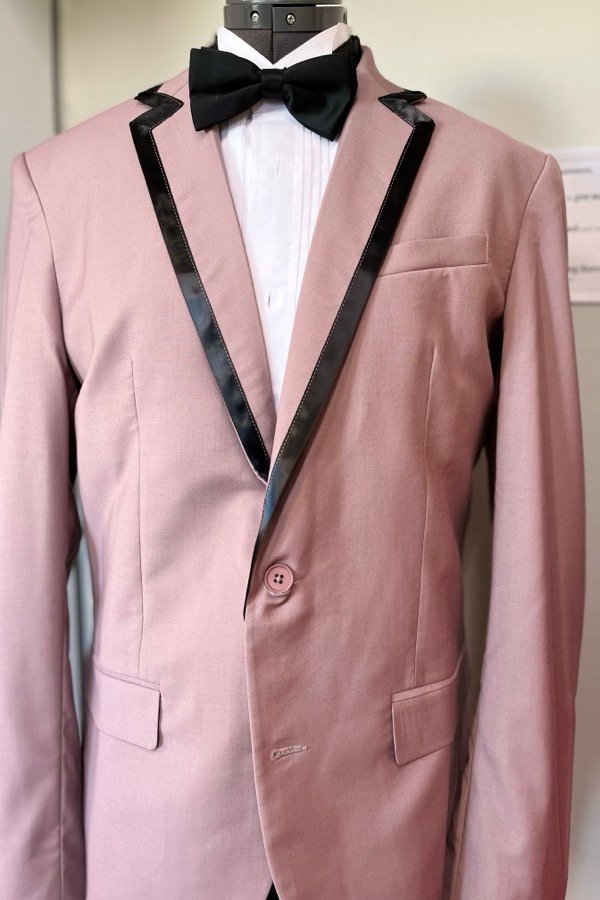 Same blazer reworked with a satin tuxedo lapel and bow tie